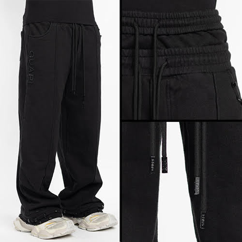 GUAPI ALL BLACK PIERCING SWEAT PANTS