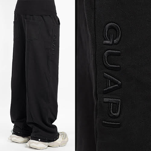 GUAPI ALL BLACK PIERCING SWEAT PANTS