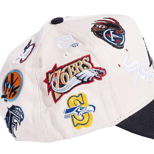 REFERENCE ALL OVER SNAPBACK CAP CREAM BLACK