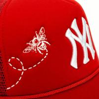 AGENT009 x RETROVERT NY TRUCKER CAP RED